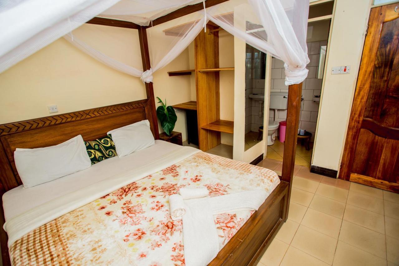 The Secret Garden Hotel Моши Экстерьер фото