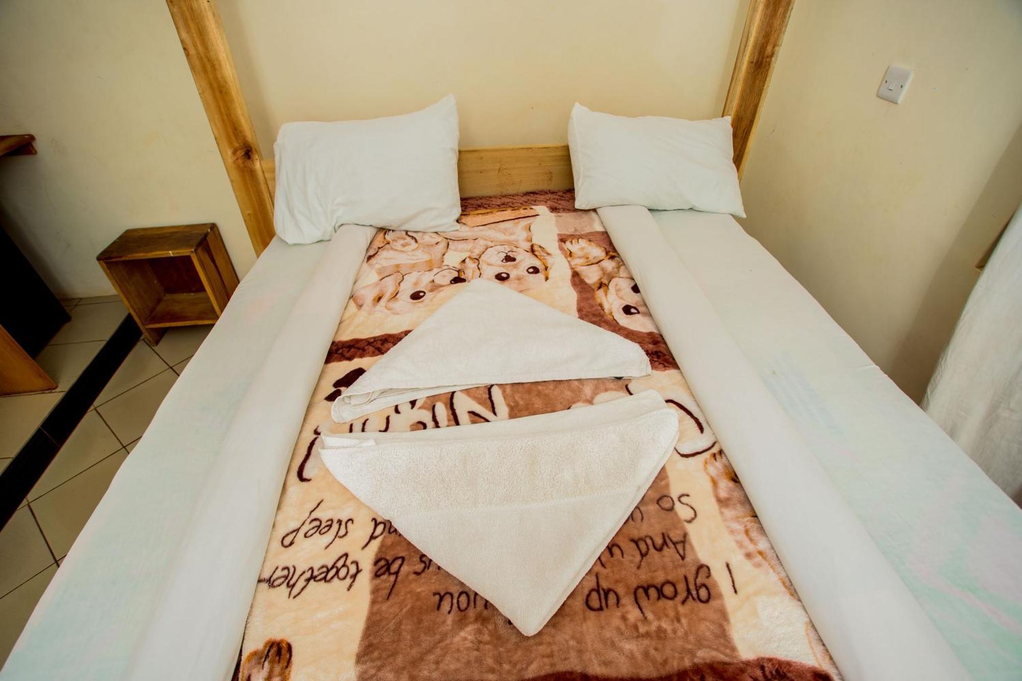 The Secret Garden Hotel Моши Экстерьер фото